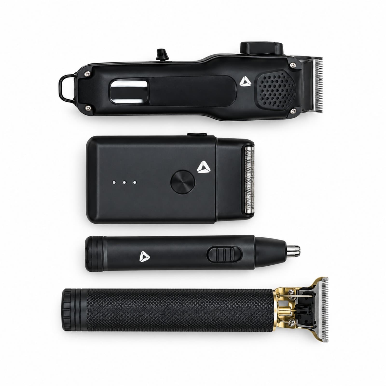 Kit profesional de peluquería Oryx KM-1503: las 4 piezas eléctricas negras (cortadora, afeitadora y dos recortadoras) sobre fondo blanco (imagen ilustrativa) — miniatura 1
