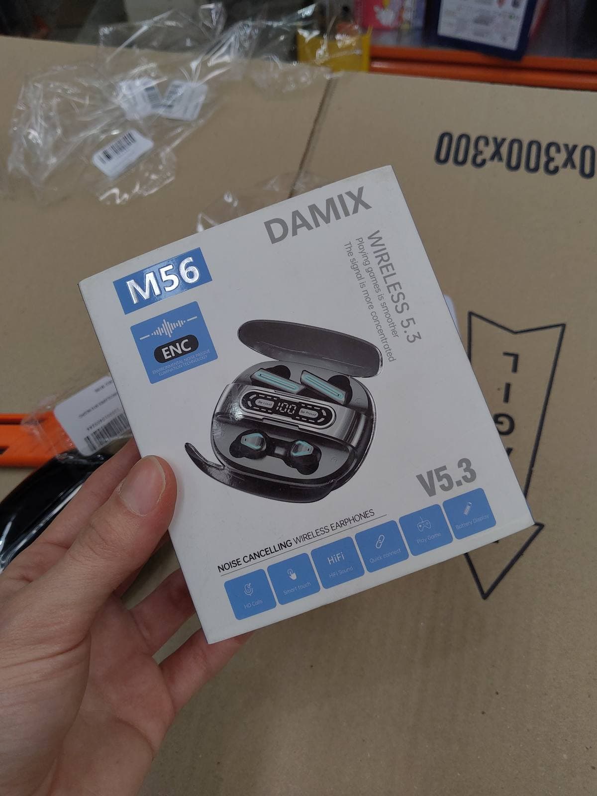 Foto real: caja de los auriculares Bluetooth M56 con tecnología ENC — miniatura 7